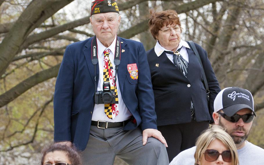 A veteran watches the Changing of the Guard at the Tomb of the Unknown Soldier in Arlington National Cemetery during Medal of Honor Day, March 25, 2016.