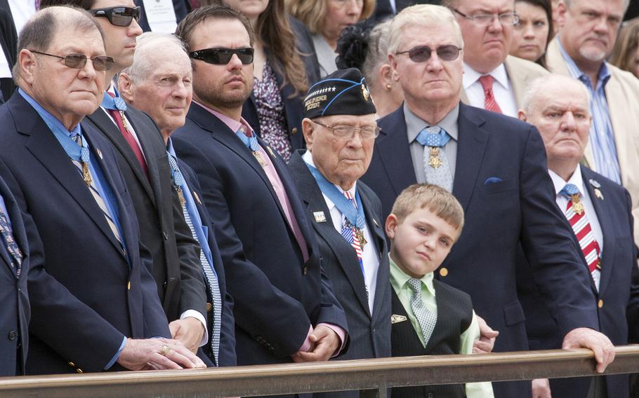 Medal of Honor recipients watched the Changing of the Guard at the Tomb of the Unknown Soldier in Arlington National Cemetery during Medal of Honor Day, March 25, 2016.