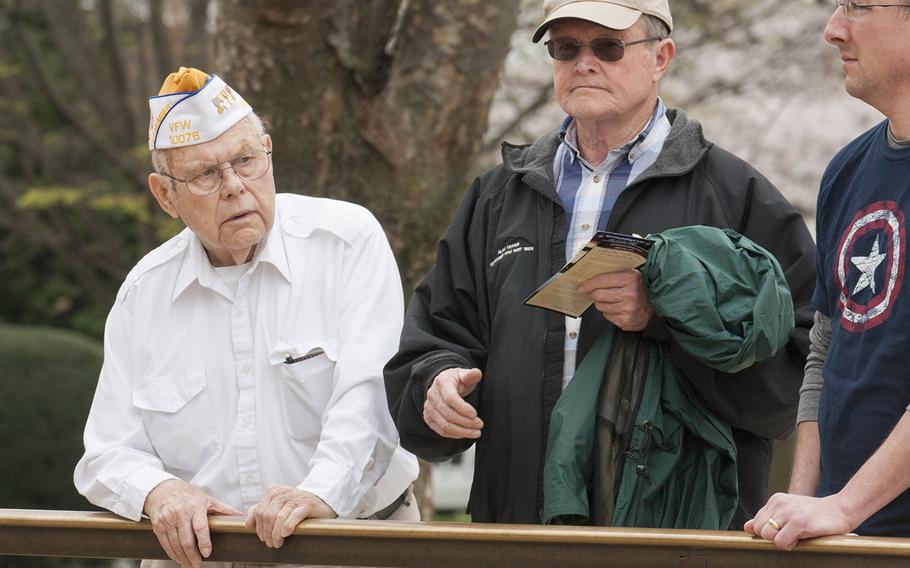 Veterans watch the Changing of the Guard at the Tomb of the Unknown Soldier in Arlington National Cemetery during Medal of Honor Day, March 25, 2016.
