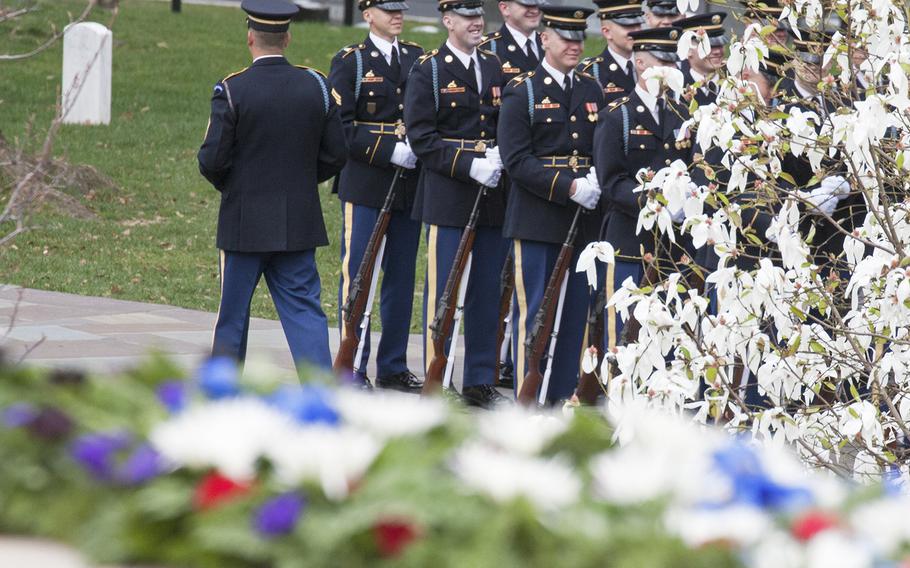 The Old Guard wait for the start of a wreath laying ceremony at the Tomb of the Unknown Soldier in Arlington National Cemetery during Medal of Honor Day, March 25, 2016.