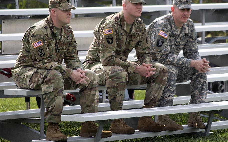 A media day Tattoo at Joint Base Myer-Henderson in Virginia on April 26, 2016. Servicemembers stop to watch the show.