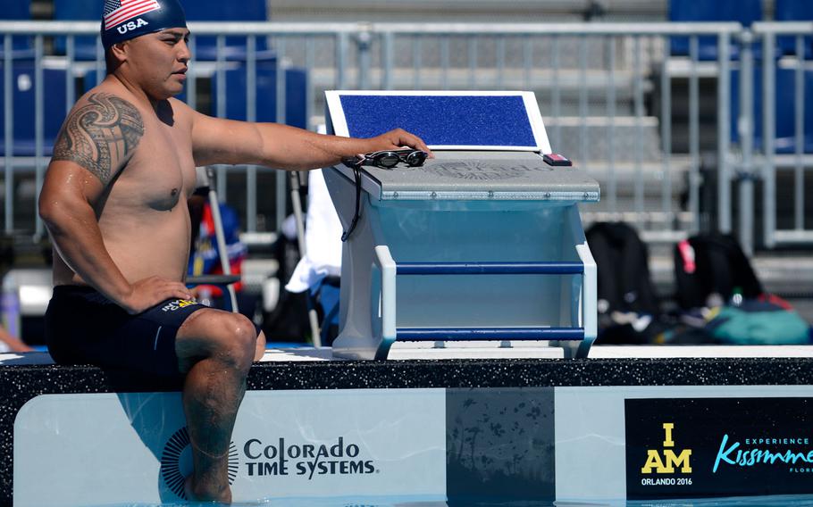 U.S. Marine Corps Sgt. Marcus Chischilly, prepares for his heat during a swim meet at the Orlando Invictus Games 2016, ESPN Wide World of Sports Complex at Walt Disney World Resort, Fla. May 6, 2016. The Invictus Games are composed of 15  nations, over 500 military competitors, competing in 10 sporting events May 8-12, 2016.