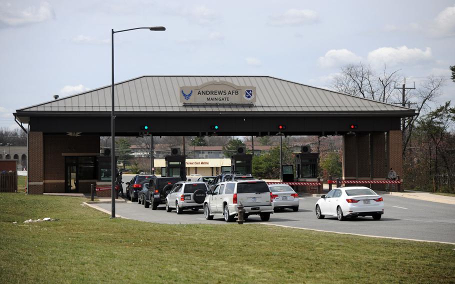 In this March 11, 2016 file photo, Joint Base Andrews personnel enter the Andrews Air Force Base main gate. 