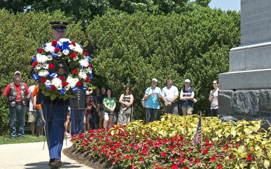 American Legion members hold a wreath-laying ceremony at the Civil War Unknowns Monument - the original Tomb of the Unknown Soldier - at Arlington National Cemetery on May 28, 2016.