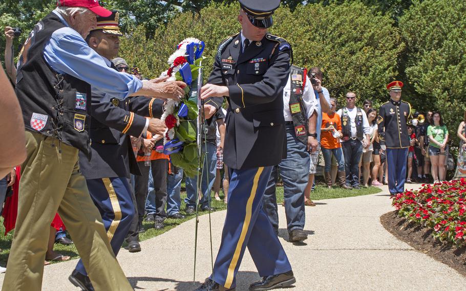 American Legion members hold a wreath-laying ceremony at the Civil War Unknown Monument - the original Tomb of the Unknown Soldier - at Arlington National Cemetery on May 28, 2016.