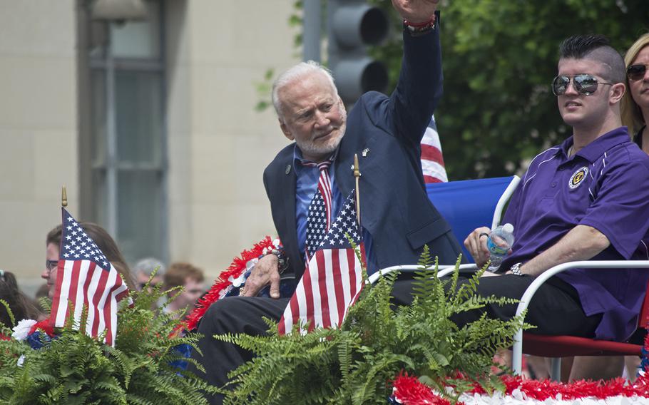Buzz Aldrin waves to the crowd during the 2016 Memorial Day Parade in Washington, D.C.