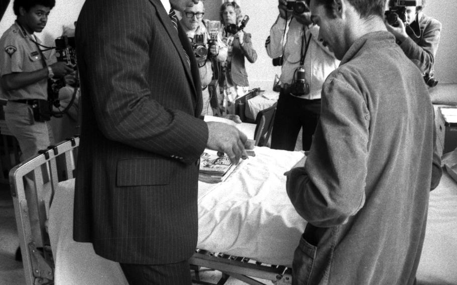 Muhammad Ali visits the hospital at Flak Casern in Augsburg, West Germany, in May, 1976.