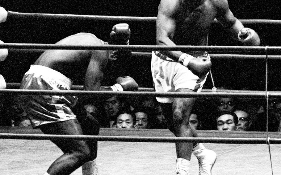 Muhammad Ali unloads on Mac Foster meet during their fight in Tokyo in 1972. Ali beat Foster in 15 rounds.