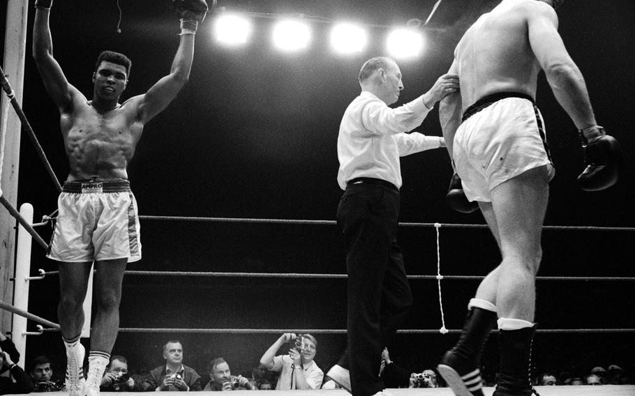 World heavyweight champion Muhammad Ali celebrates his 12th-round win over European champ Karl Mildenberger at Frankfurt's Forest Stadium in September, 1966.