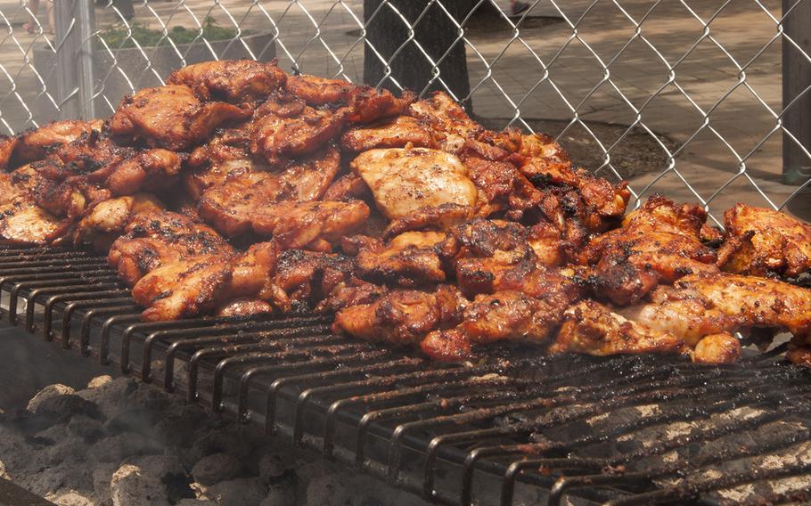 BBQ chicken grills during the Military Chef Cook-Off - part of the Annual Giant National Capital Barbecue Battle - in Washington, D.C., on June 25, 2016.