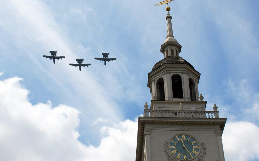 In a 2009 file photo, A-10 Thunderbolts fly over Independence Hall during the Independence Day Celebration in Philadelphia.