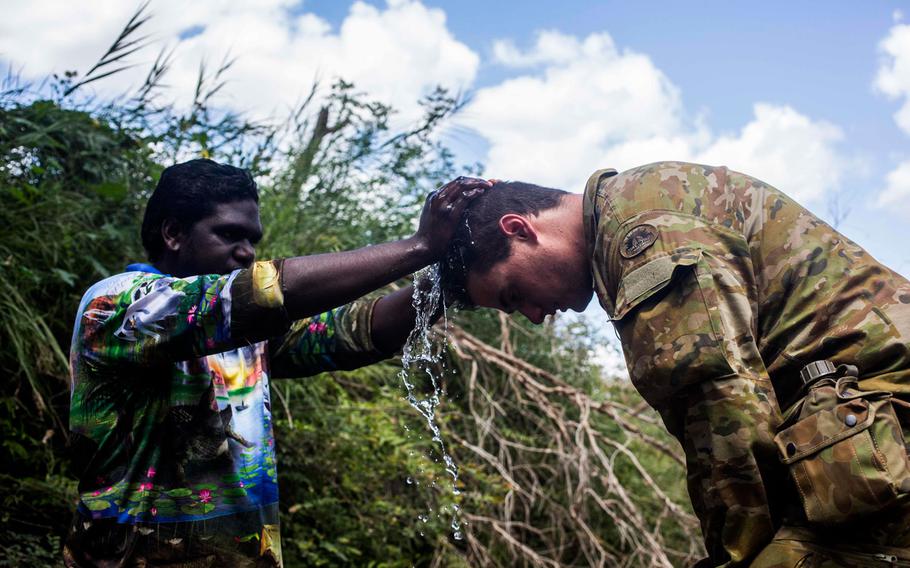 Australian Army soldier Lt. David Hasler receives a welcome to country during Exercise Kowari in the Northern Territory, Australia, August 31, 2016. The purpose of Exercise Kowari is to enhance the United States, Australia, and China’s friendship and trust, through trilateral cooperation in the Indo-Asia-Pacific region.
