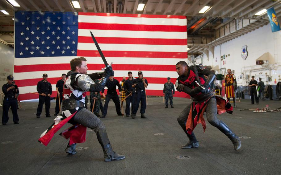 Knights from the family dinner theater restaurant Medieval Times perform for Sailors on board amphibious assault ship USS America (LHA 6) in the ship’s hangar bay during the inaugural Los Angeles Fleet Week. Fleet week offers the public an opportunity to tour ships, meet Sailors, Marines, and members of the Coast Guard and gain a better understanding of how the sea service support the national defense of the United States and freedom of the seas.