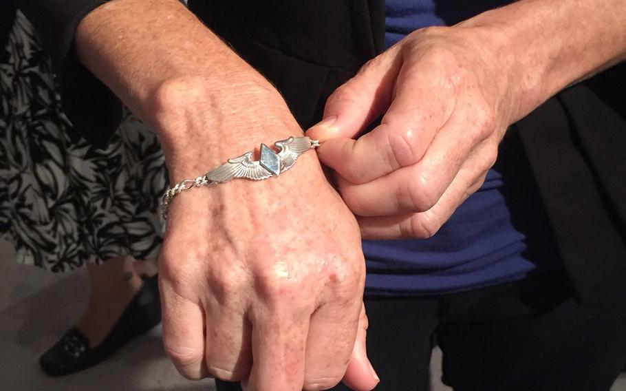 The funeral service for World War II WASP pilot Elaine Harmon at Arlington National Cemetery on Sept. 7, 2016. Rep. Martha McSally, R-Arizona, shows off the bracelet Harmon's family presented her at the end of the memorial service. The bracelet shows the WASPs wings on one side and on the other side engraved is the bill number that McSally helped get passed that allowed WASPs to be buried at Arlington. 