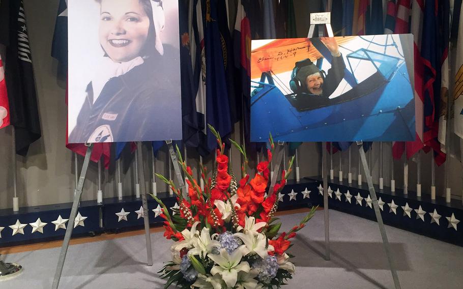 The funeral service for World War II WASP pilot Elaine Harmon at Arlington National Cemetery on Sept. 7, 2016. Photos of her graced the stage at the memorial service. 