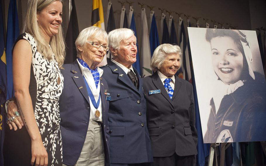 The funeral service for World War II WASP pilot Elaine Harmon at Arlington National Cemetery on Sept. 7, 2016. Erin Miller, the granddaugher of Elaine (in the photograph to the far right), poses with three WASPs after the memorial service. 