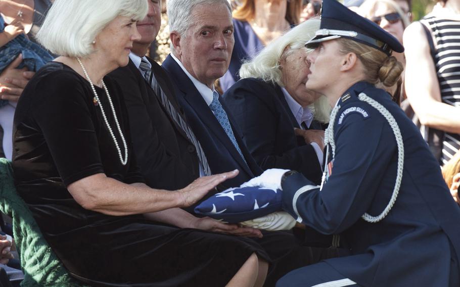 The funeral service for World War II WASP pilot Elaine Harmon at Arlington National Cemetery on Sept. 7, 2016. Terry Harmon, the daughter of Elaine, receives the flag from Air Force Capt. Jennifer Lee.