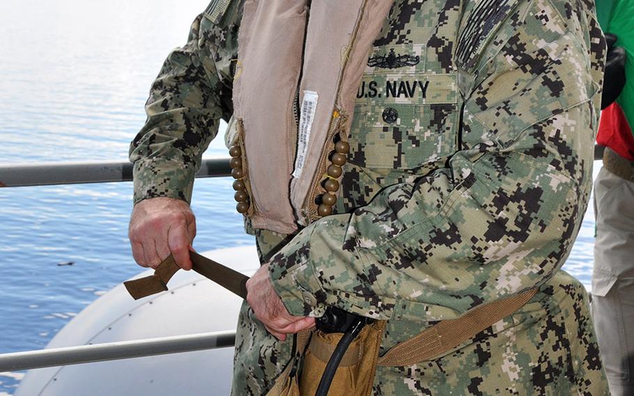 Adm. Kurt Tidd, Commander of U.S. Southern Command, preparing to get on his helicopter to depart from the amphibious assault ship Iwo Jima, which arrived off the coast of Haiti on Oct. 13 and will assume the lead in  military assistance for Hurricane Matthew relief efforts.