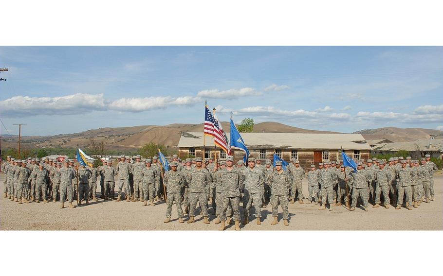 Soldiers line up in formation.