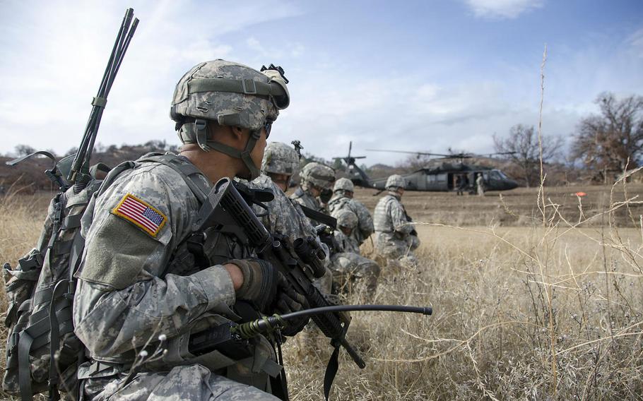 Soldiers of the California National Guard's 40th Infantry Division rehearsing an air assault mission at Fort Hunter Liggett in 2014. The Los Angeles Times/Tribune Washington Bureau reported this month, that the Pentagon has been demanding repayment of enlistment bonuses — which often reached $15,000 or more — from thousands of California Guard soldiers, many of whom had served multiple combat tours in Iraq and Afghanistan.