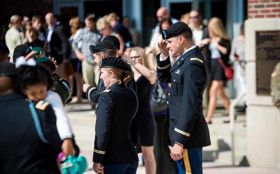 Students from the Infantry Basic Officer Leader Course celebrate with their families and fellow classmates after graduation, October 26, 2016, at McGinnis-Wickam Hall in Fort Benning.