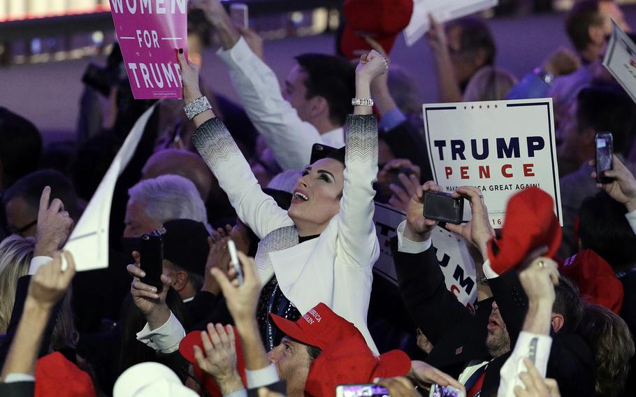 Supporters cheer as they wait for President-elect Donald Trump to speak during his election night rally, Wednesday, Nov. 9, 2016, in New York.