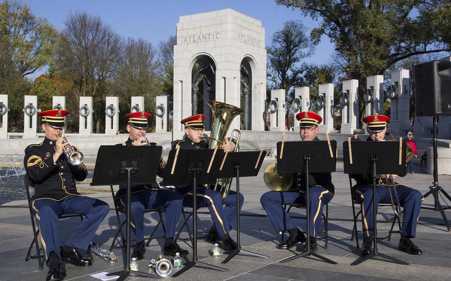 The United States Army Band quintet plays during a Veterans Day ceremony at the National World War II Memorial in Washington, D.C., Nov. 11, 2016.