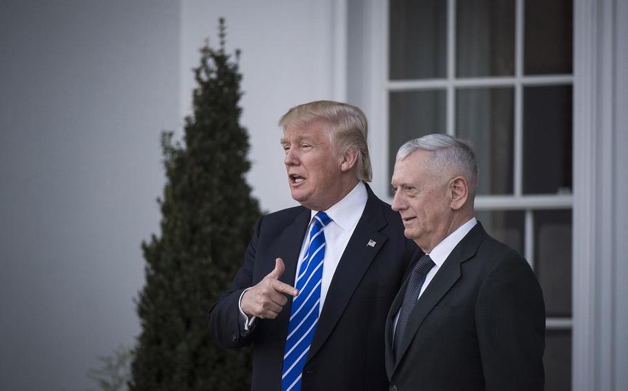 President-elect Donald Trump walks out with retired Marine Corps Gen. James Mattis after a meeting on Nov. 19, 2016.
