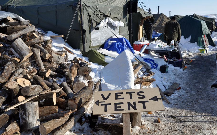 Veterans scattered across one of the main protest camps Saturday, Dec. 3 after signing it at the "vet tent," which is being used as a headquarters for the group.