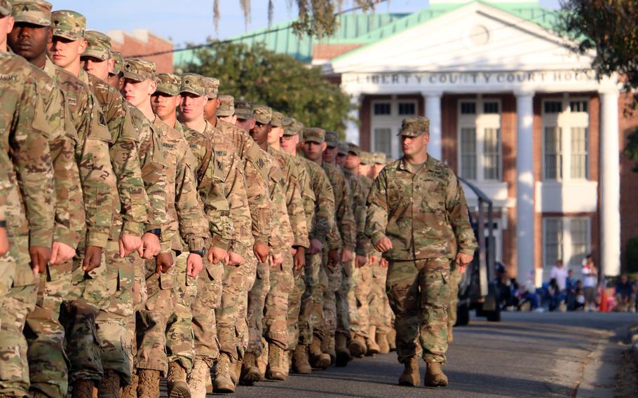 Soldiers of 3rd Infantry Division march during the Liberty County Veterans Day parade in Hinesville, Ga., November 11, 2016. 