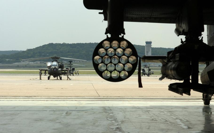 An AH-64D Apache attack helicopter is prepped for flight at Robert Gray Army Air Field, Fort Hood, Texas, on Aug. 26, 2008. The Army announced Thursday, Dec. 29, 2016, that two National Guardsmen were killed after their Apache helicopter crashed into Galveston Bay in Texas, the day before.