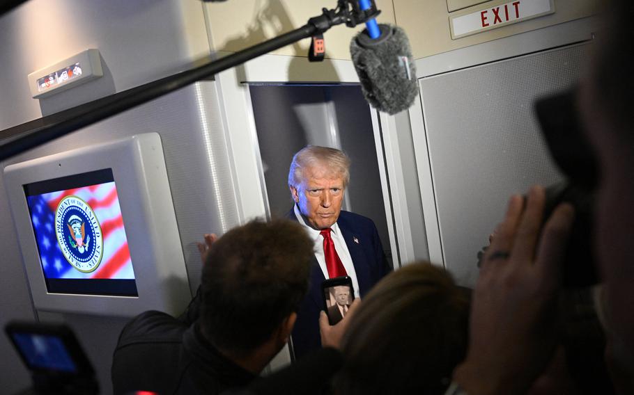 The US president talks with reporters in Florida.