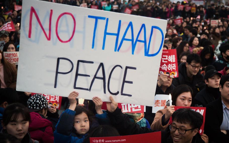 South Koreans celebrate the impeachment of President Geun-hye Park at Gwanghwamun Square, Seoul, South Korea, Saturday, March 11, 2017.