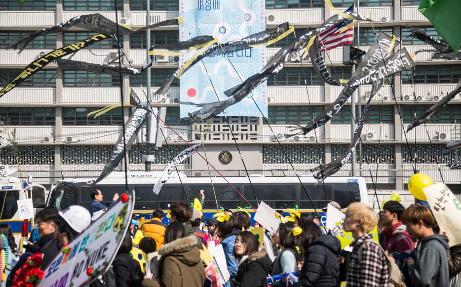 South Koreans protest an advanced anti-missile system, known as THAAD, during a rally celebrating the impeachment of President Geun-hye Park at Gwanghwamun Square, Seoul, South Korea, March 11, 2017.