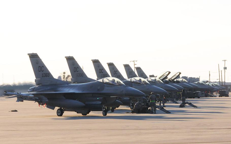 F-16C Fighting Falcons from the 113th Wing, D.C. Air National Guard, adorn the flight line at Sentry Savannah 15-1, Feb. 11, 2015. 