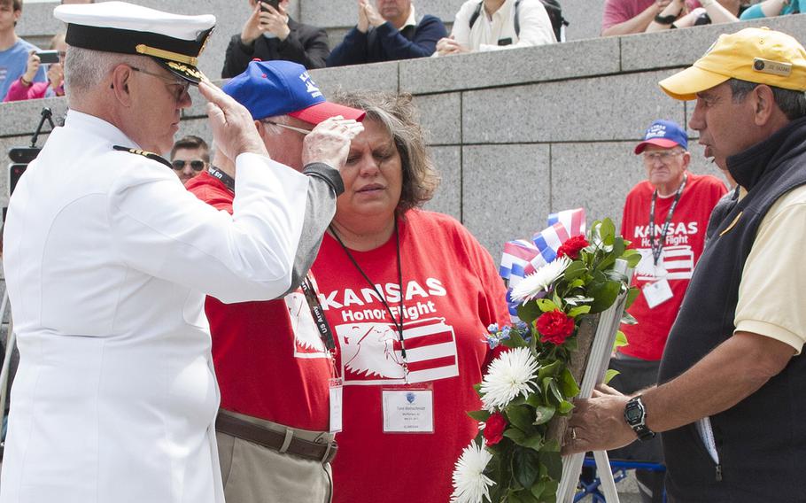 Navy Chaplain Commander Michael Pumphrey lays a wreath with World War II veteran Charles Friedley during the Battle of the Coral Sea 75th Anniversary Commemoration at the World War II Memorial in Washington, D.C., on May 4, 2017. Friedley was a paratrooper in the 82nd Airborne. Pumphrey and Friedley were representing the United States during the ceremony. 