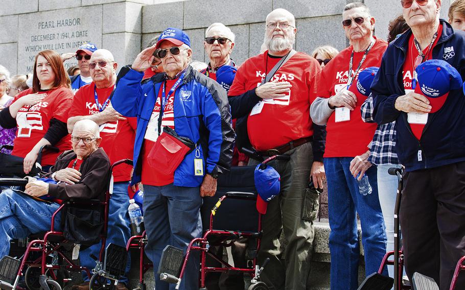 Veterans with the Kansas Honor Flight salute at the start of the Battle of the Coral Sea 75th Anniversary Commemoration at the World War II Memorial in Washington, D.C., on May 4, 2017.