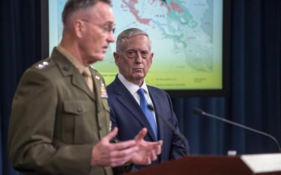 Defense Secretary Jim Mattis and Marine Gen. Joseph Dunford, the Chairman of the Joint Chiefs of Staff, attend a May 19, 2017, briefing at the Pentagon where they gave an update on the fight against the Islamic State.