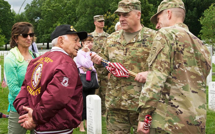 World War II veteran Harold Radish talks with Army Chief of Staff Gen. Milley during Flags In at Arlington National Cemetery on May 25, 2017. 