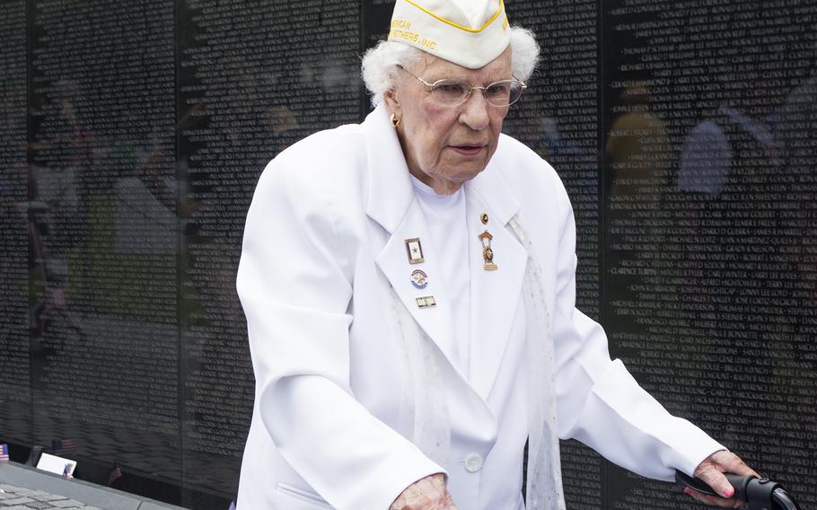 Emogene Cupp walks along the Vietnam Wall at the start of the Memorial Day ceremony on May 29, 2017.