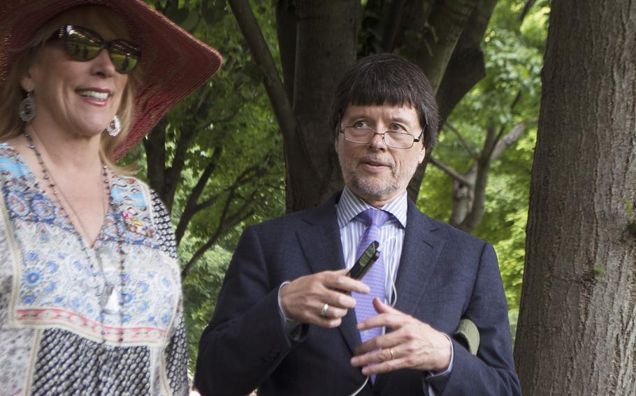 Ken Burns chats before the start of the Vietnam Wall Memorial Day ceremony on May 29, 2017.