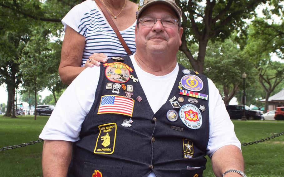 Dennis Mason and his wife Juliet pose near the Vietnam Wall in Washington, D.C., on May 29, 2017. 