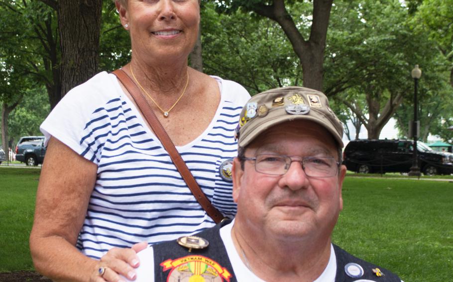 Dennis Mason and his wife Juliet pose near the Vietnam Wall in Washington, D.C., on May 29, 2017.