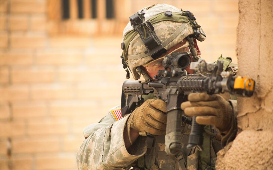 A soldier with the Mississippi Army National Guard provides security during an exercise at the National Training Center in Fort Irwin, Calif., on May 30, 2017. 