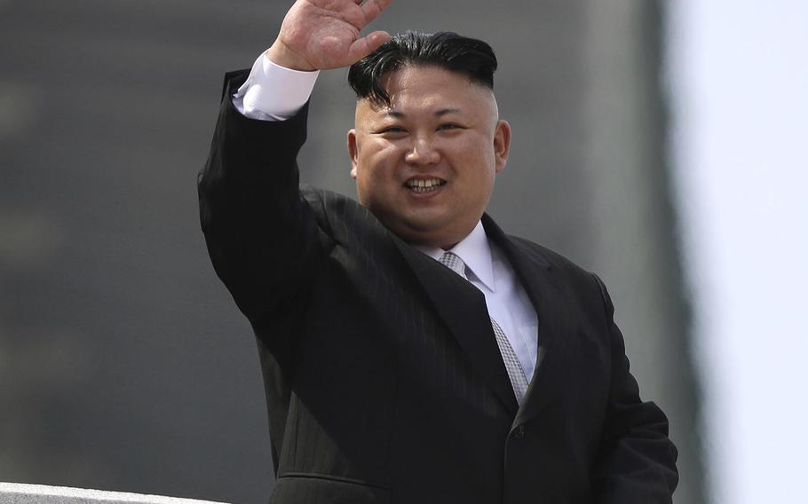 North Korean leader Kim Jong Un waves during a military parade to celebrate the 105th birth anniversary of Kim Il Sung in Pyongyang, North Korea, on Saturday, April 15, 2017.