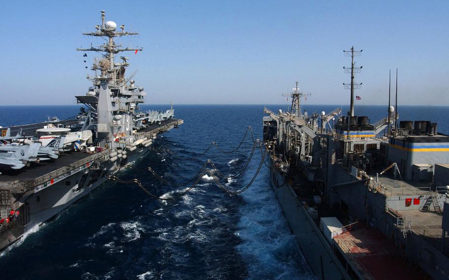 The Military Sealift Command oiler USNS Supply conducts an underway replenishment with USS George Washington (CVN 73) in 2004.