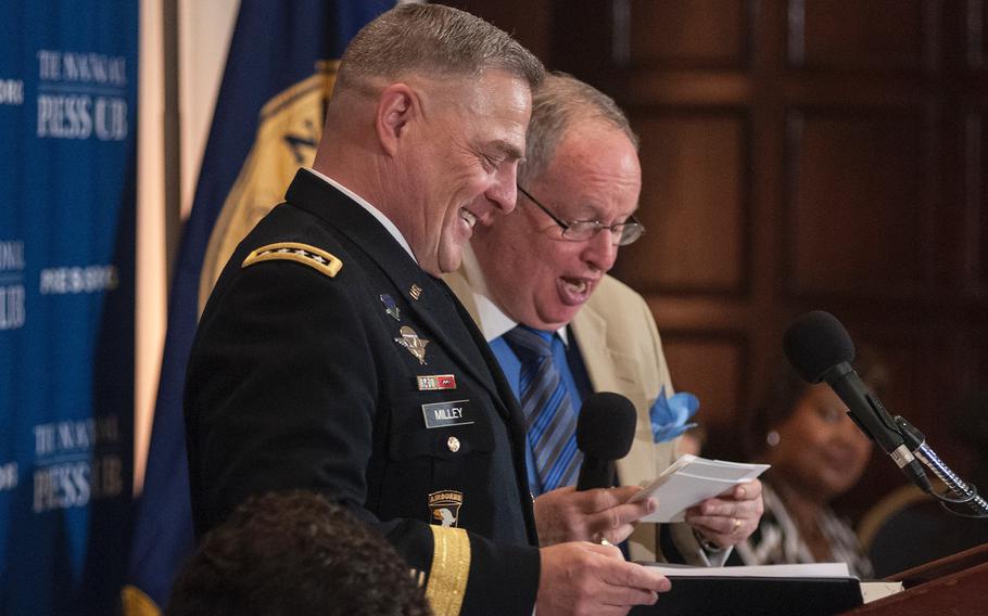 Army Chief of Staff Gen. Mark Milley responds with laughter at the National Press Club in Washington on Thursday, July 27, 2017, when asked how he learned of President Donald Trump's tweets on transgender personnel in the military. "I saw it on the news," Milley said.