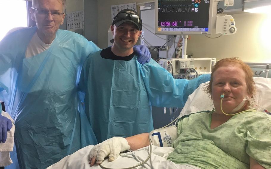 Staff Sgt. Nicholas “Bruce” Davis, a cannon crew member and section chief assigned to C Battery, 1st Battalion, 320th Field Artillery Regiment, 101st Airborne Division Artillery, 101st Airborne Division, visits Rick and Sharon Steiert in the hospital as they recover from a car accident that occurred on June 9, 2017. Davis rescued them and received a nomination for the Soldier’s Medal from his unit.