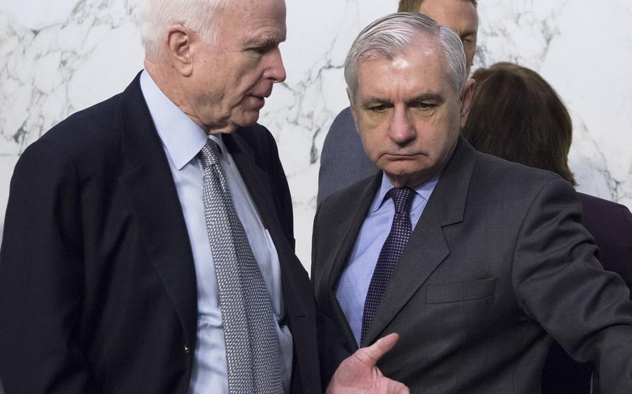 Senate Armed Services Committee Chairman John McCain, R-Ariz., talks with Ranking Member Jack Reed, D-R.I., before a hearing in March, 2017.