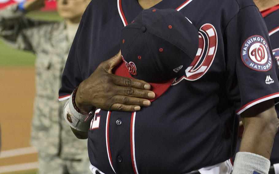 Washington Nationals manager Dusty Baker stands for the singing of the national anthem U.S. Air Force Night at Nationals Park in Washington, D.C., Sept. 17, 2017.